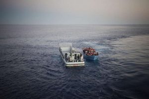 A boatload of people, some of them likely in need of international protection, are rescued in the Mediterranean Sea by the Italian Navy. The group were risking their lives to reach Europe from North Africa. © UNHCR/A.D’Amato