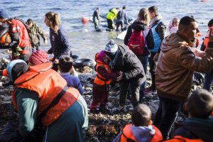 A refugee from Syria hugs her crying daughter moments after reaching the Greek Island of Lesvos from Turkey in an inflatable boat. © UNHCR/A. Zavallis