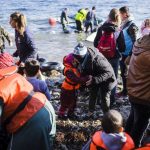 A refugee from Syria hugs her crying daughter moments after reaching the Greek Island of Lesvos from Turkey in an inflatable boat. © UNHCR/A. Zavallis